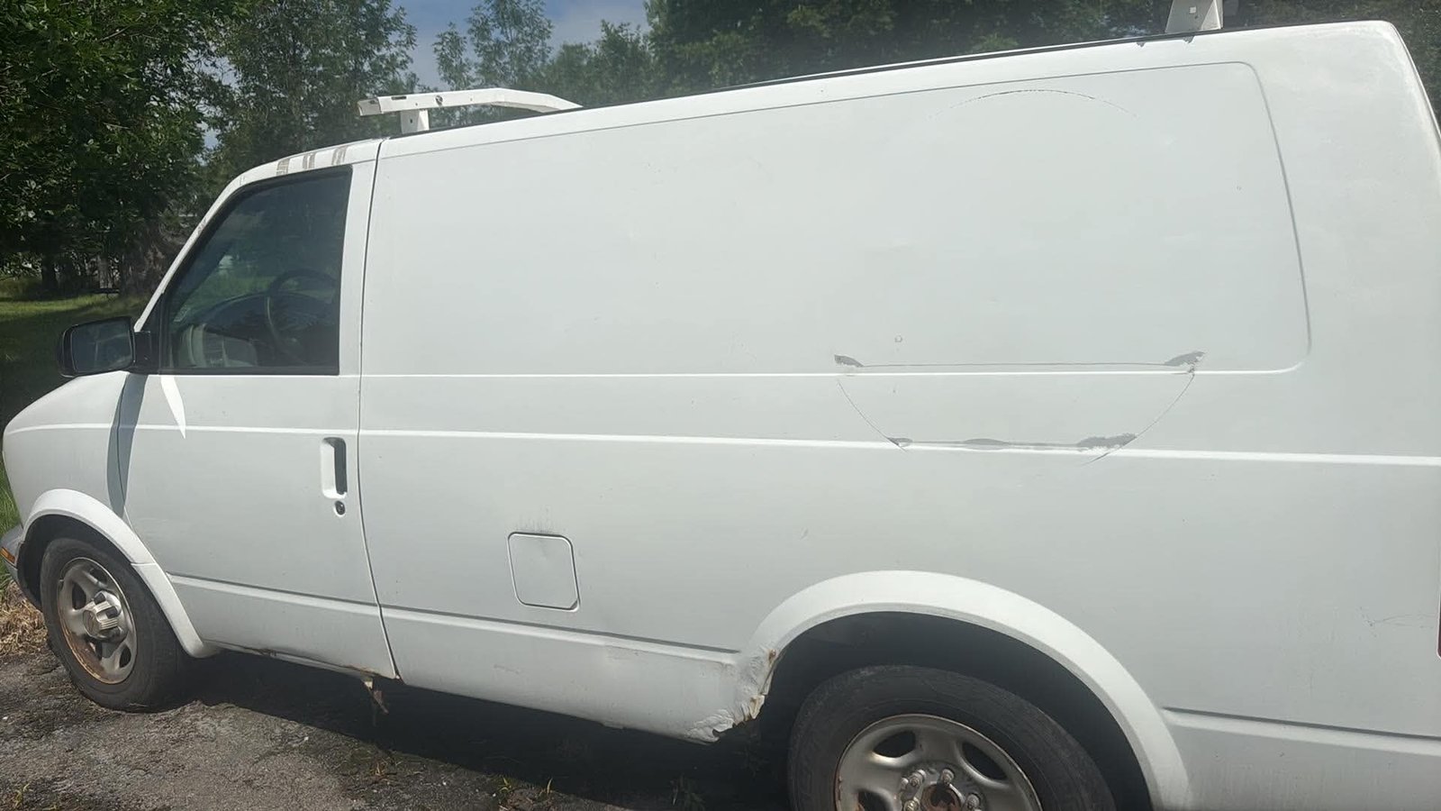 Chevy Astro work van used to transport goats for Only Goats Farm goatscaping jobs