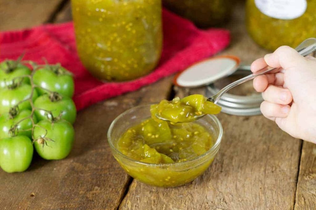Green tomato chow chow on a spoon